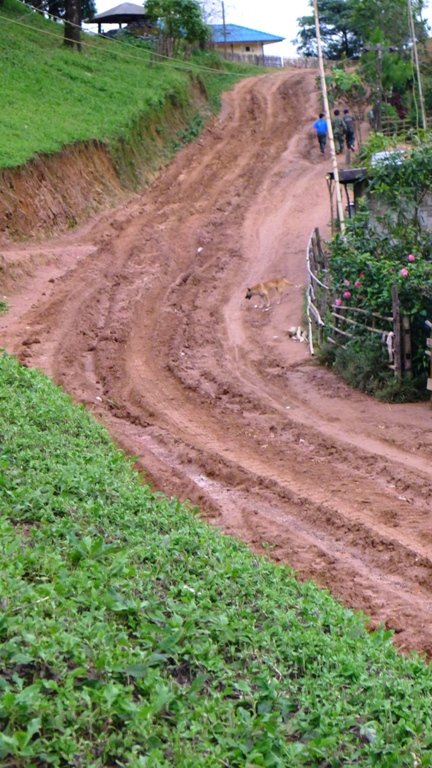 mud road into shan army village.jpg